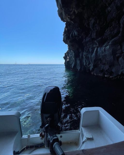 BOAT TOUR WITH APERITIF ON BOARD IN THE CYCLOPS ISLANDS - Aperitif on board: local wines, street food, and Etna’s silhouette
