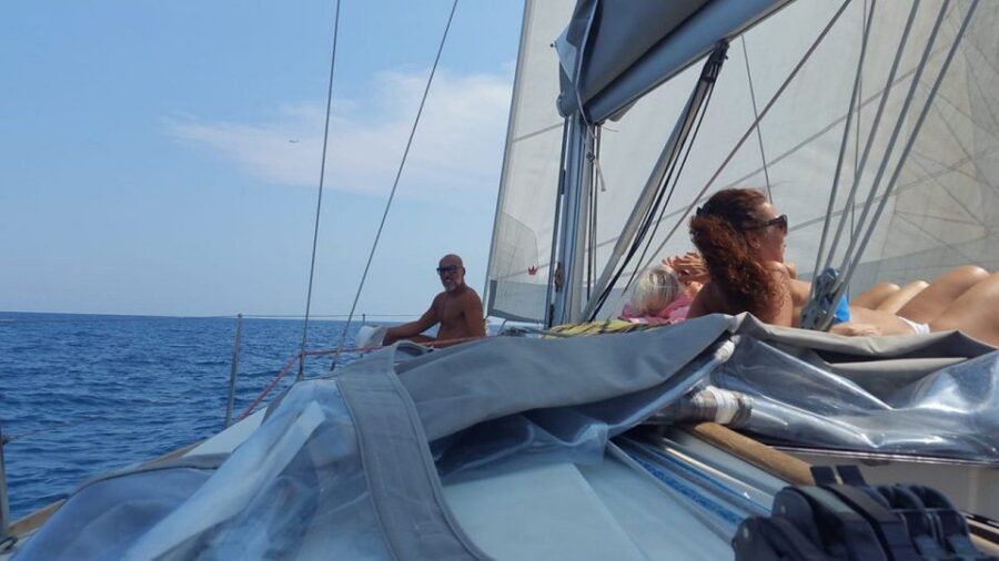 Catania: Coastline Sailing Trip 6hr with Aperitif and Lunch - Caves of Ulysses Swim Stop: When the Coast Looks Best