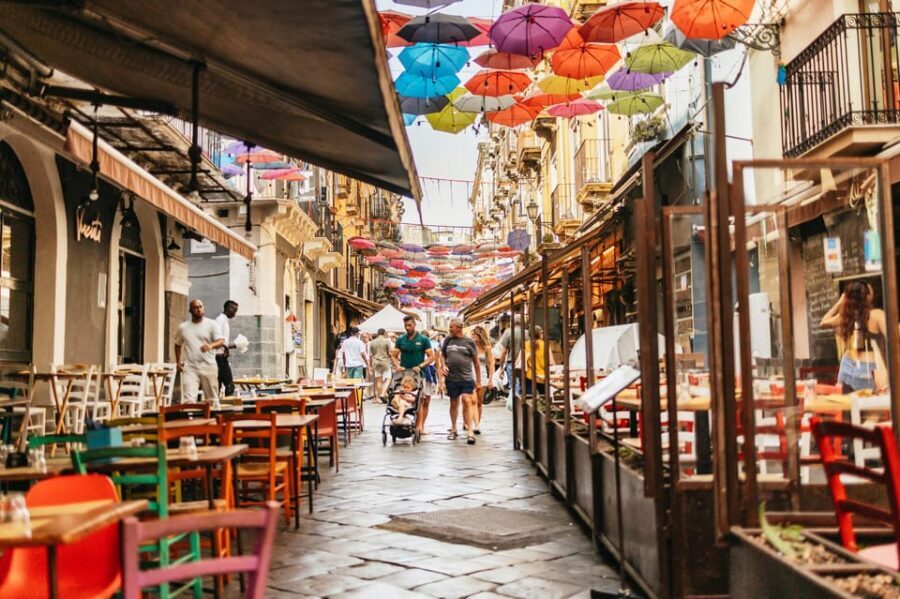 Catania: Guided Street Food Walking Tour - Piazza Duomo and Piazza Università: the city’s big stage, with snacks