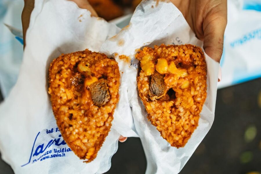 Catania: Guided Street Food Walking Tour - Catania classics in motion: cipollina, arancino, and selz
