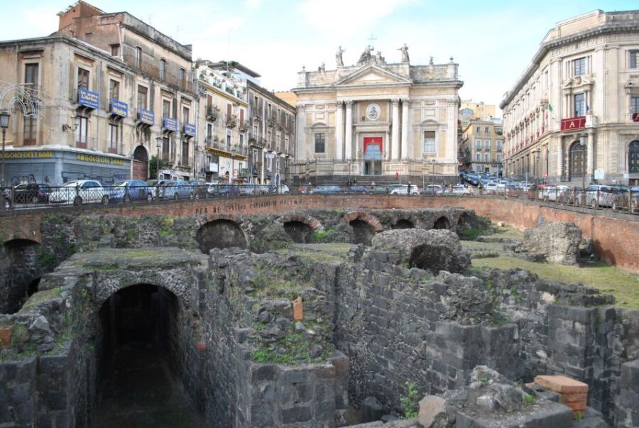 Catania: Underground and Street Food Walking Tour - Starting at the Roman amphitheater, then walking straight into the past
