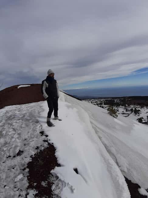 Etna: Jeep excursion and trekking suitable for everyone. Shoes and jacket provided free of charge. - Grotta delle Nevi: stepping into the mountain with helmet and lamps
