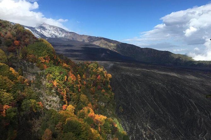 Etna Morning Tour 2000 mt. - Lava cave time: helmet, torches, and the value of going underground