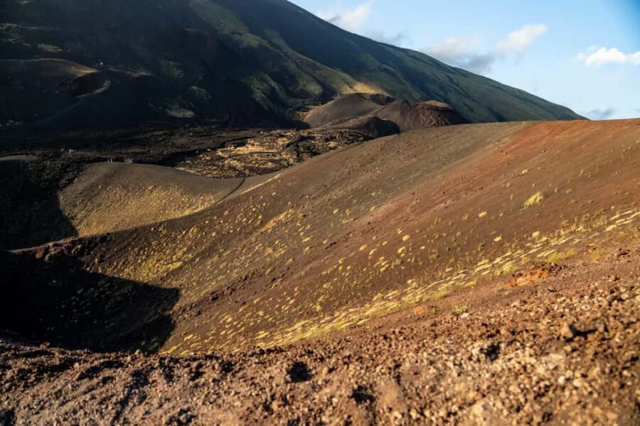 From Catania: Mount Etna Sunset Tour with Tasting and Cave - Entering a Lava Cave: Helmet, Headlamp, and an Unusual Kind of Quiet