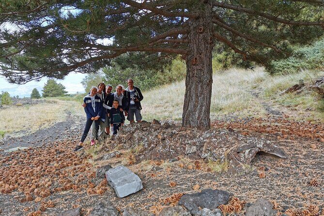 From Catania: Private mt. Etna trekking and pic-nic - Entering Grotta di Serracozzo With Helmets and Torches