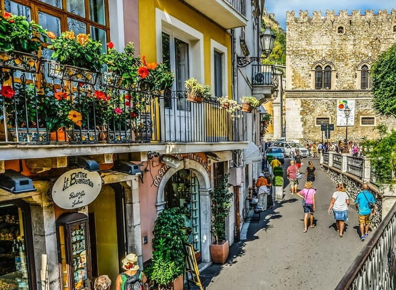 From Catania: Taormina, Isola bella & Castelmola tour - Taormina old town walk: Ancient Theatre and the classic piazzas