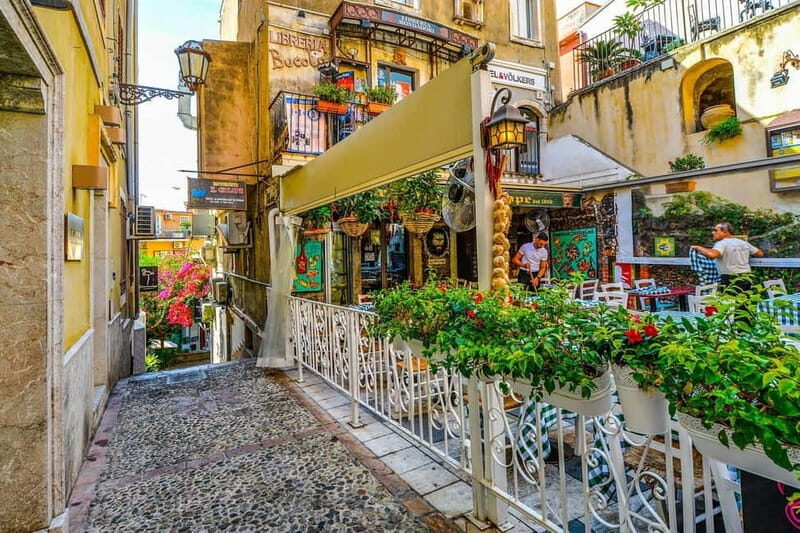 From Catania: Taormina, Isola bella & Castelmola tour - Castelmola village stop: quick visit for panoramas