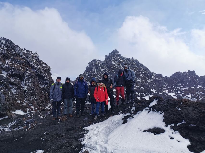 Mt Etna: Winter Trekking Tour with Optional Catania Transfer - Upper Silvestri craters: finishing with crater-country views